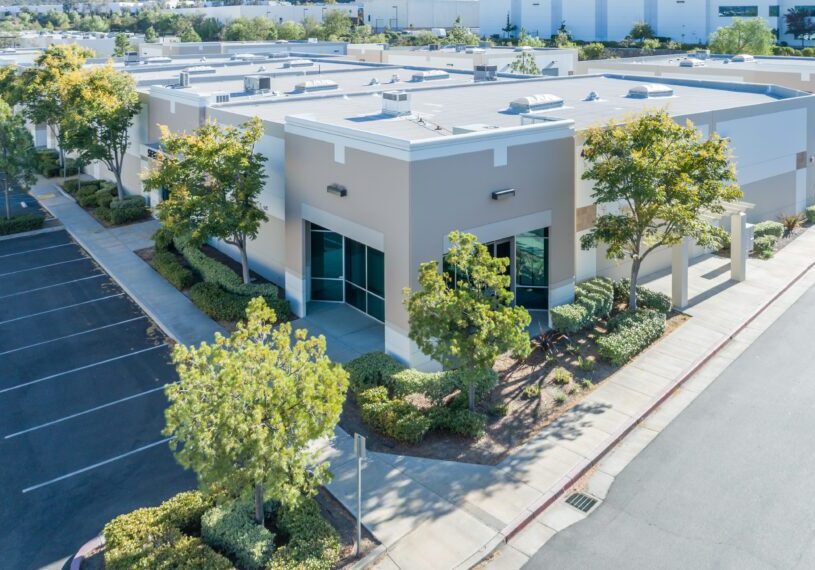 A building with many trees in the middle of it